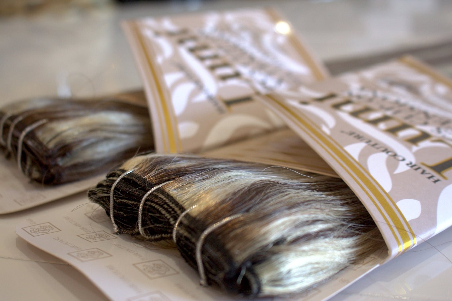 Lumi | Exclusive Highlighted Clip-In Human Hair Extensions 22inches